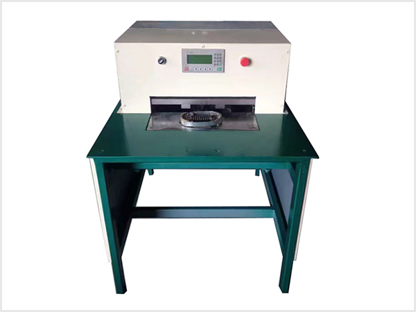 Flattening machine for motorcycle brake shoe